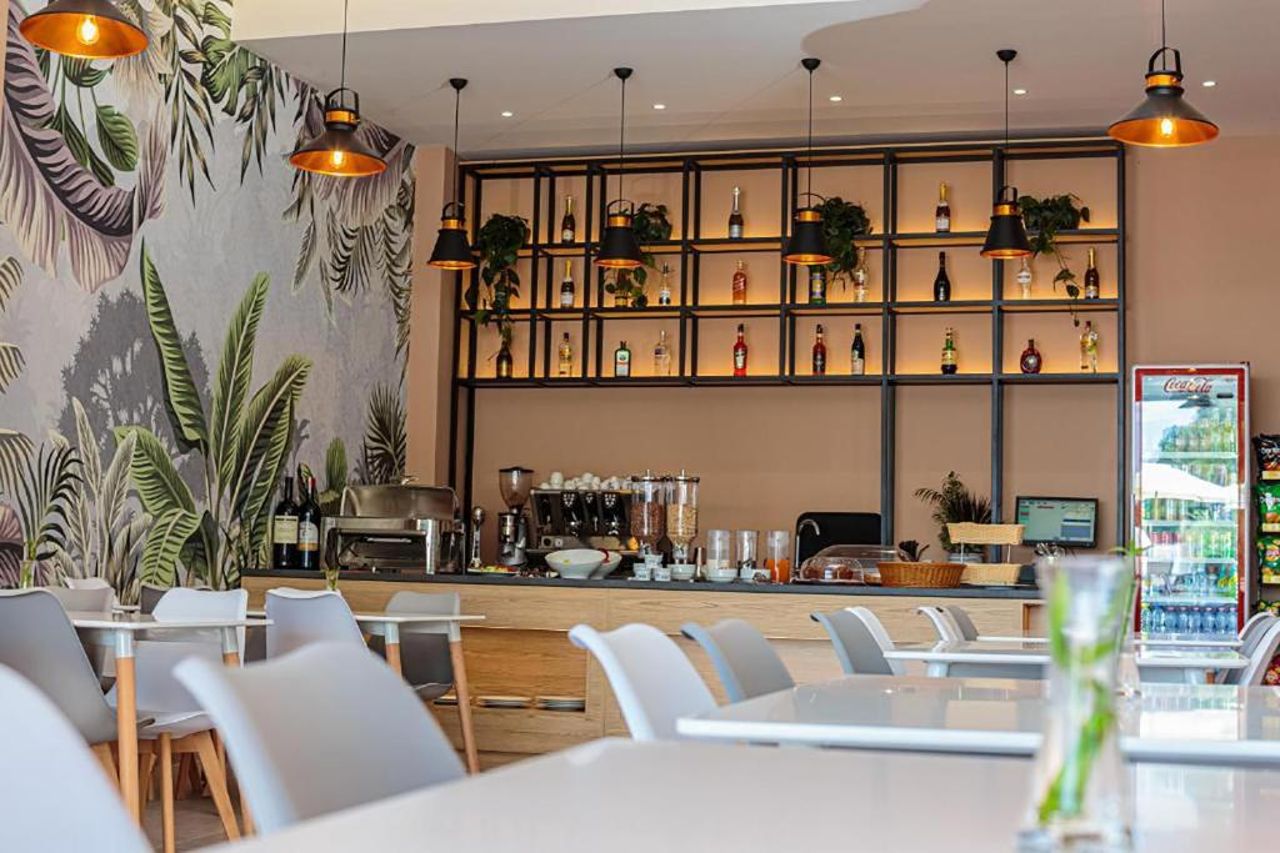 Toto Boutique Hotel & Apartments