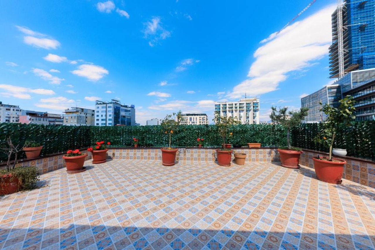 One-bedroom rooftop skyline central hidden gem in Tirana