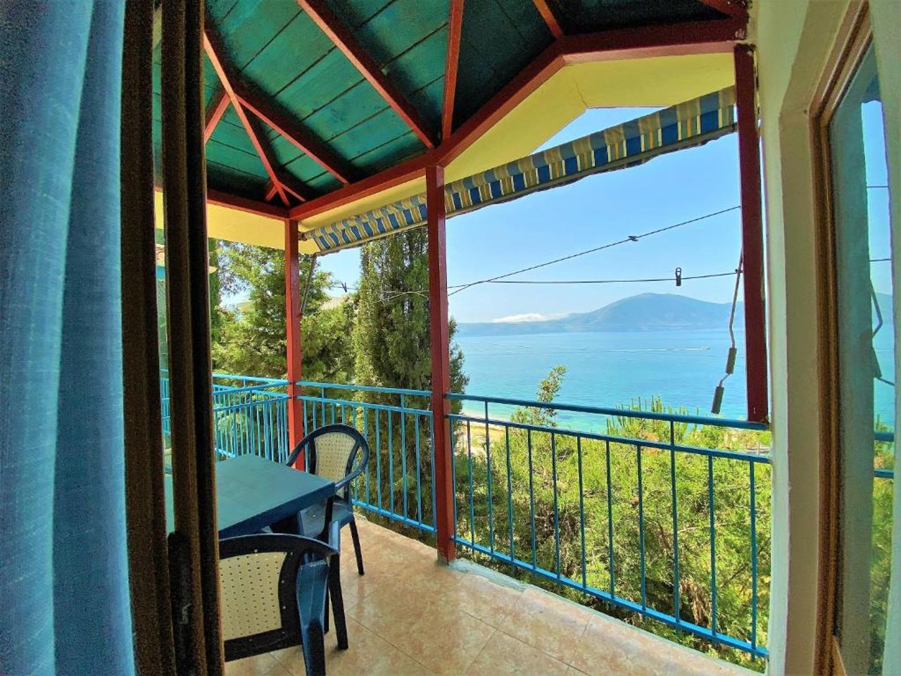 Second Room of Cozy Beachside Haven - Panoramic Radhime Retreat with Balcony Dining