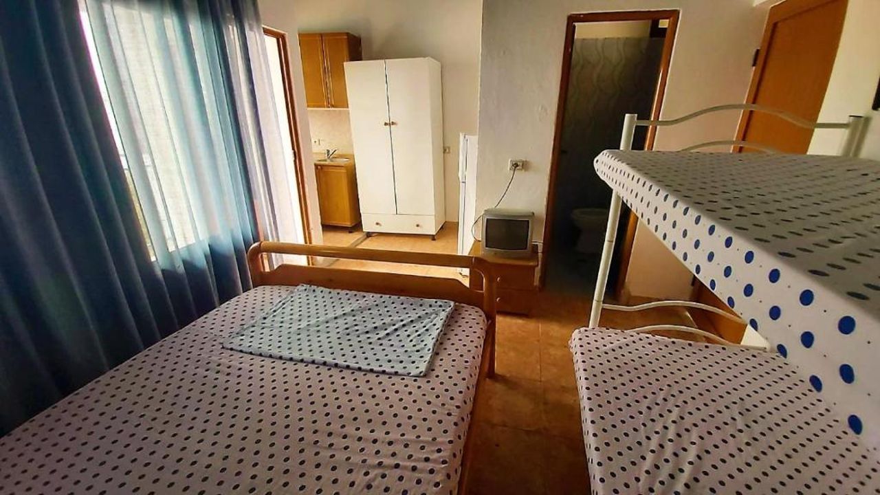 Second Room of Cozy Beachside Haven - Panoramic Radhime Retreat with Balcony Dining