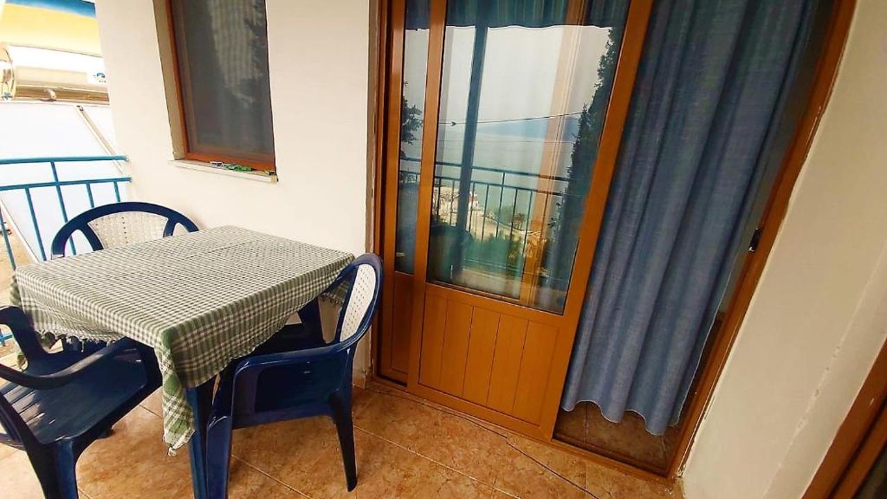 Third Room of Cozy Beachside Haven - Panoramic Radhime Retreat with Balcony Dining