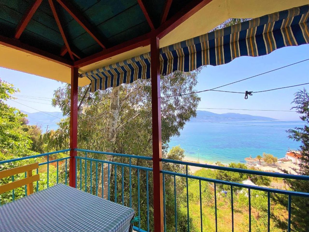 Fourth Room of Cozy Beachside Haven - Panoramic Radhime Retreat with Balcony Dining