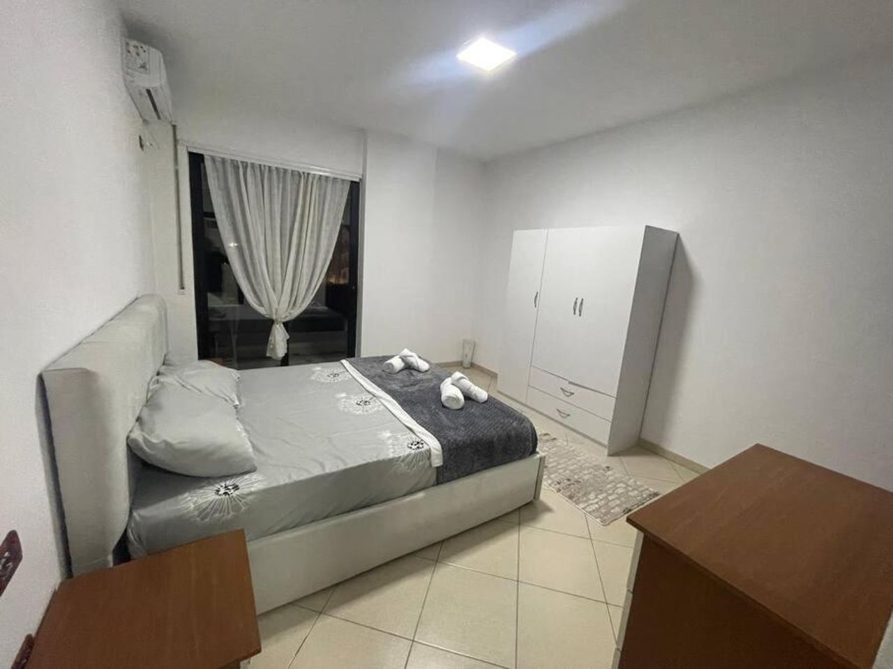 Ardit’s apartment.
