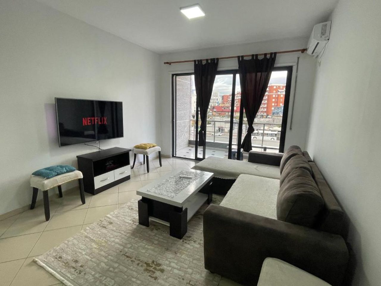 Ardit’s apartment.